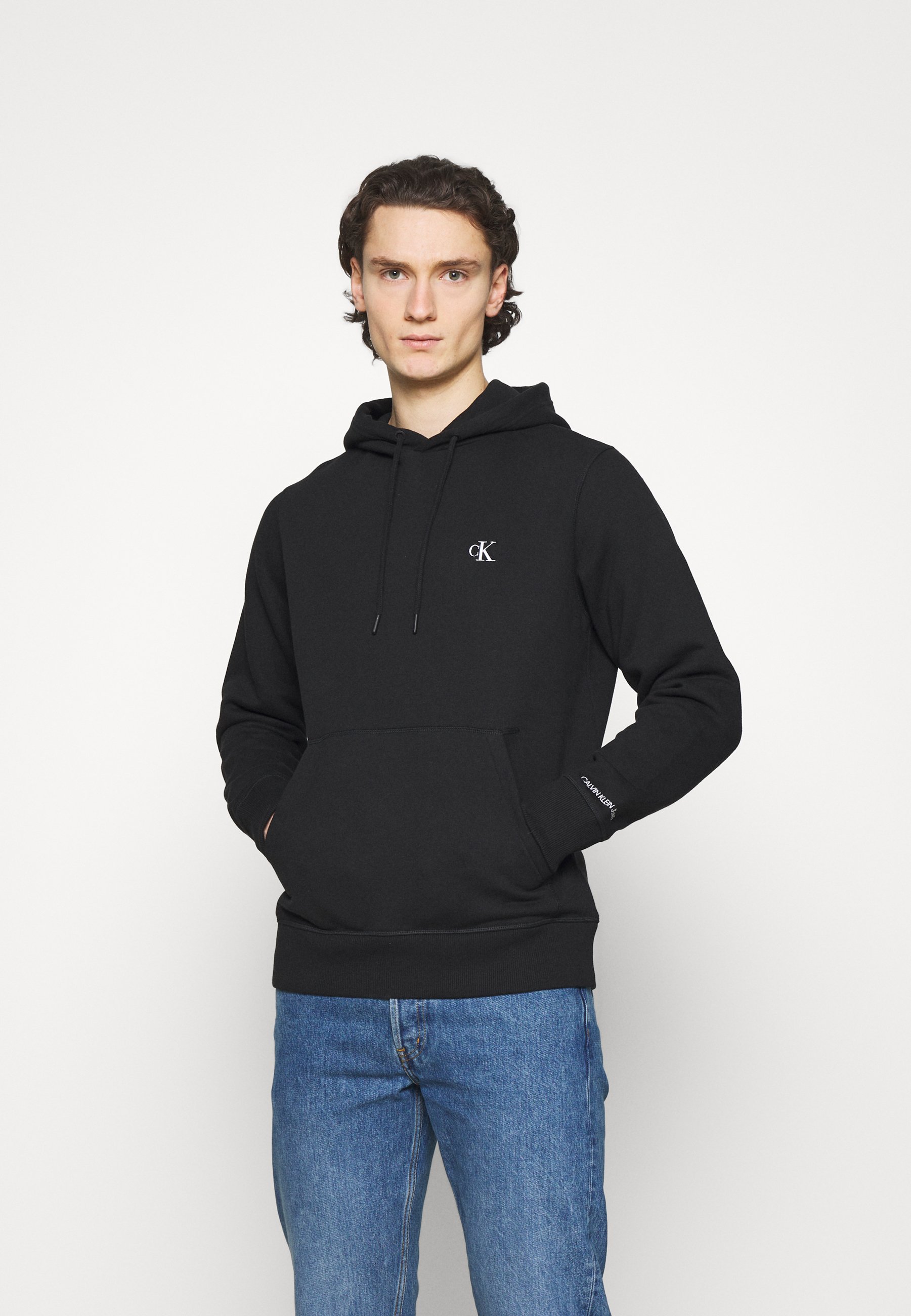 Sweats & Hoodies Calvin Klein Jeans ESSENTIAL REGULAR HOODIE - Sweatshirt - black